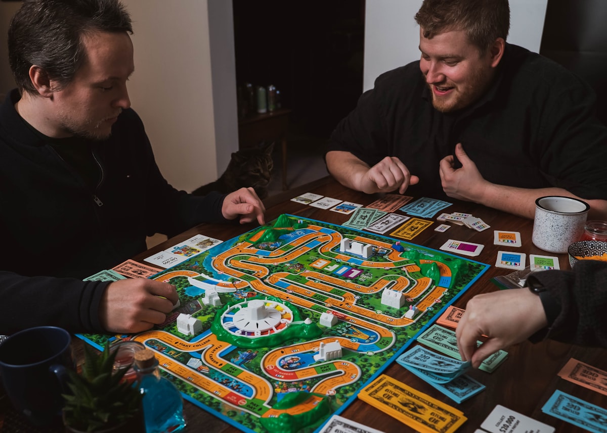 Friends playing a board game together